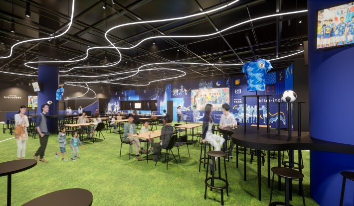 公園感のある大型ビジョンを備えた芝生エリア