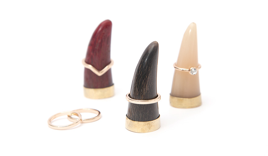 An artistic ring holder by amabro, where buffalo horn and brass make rings shine.