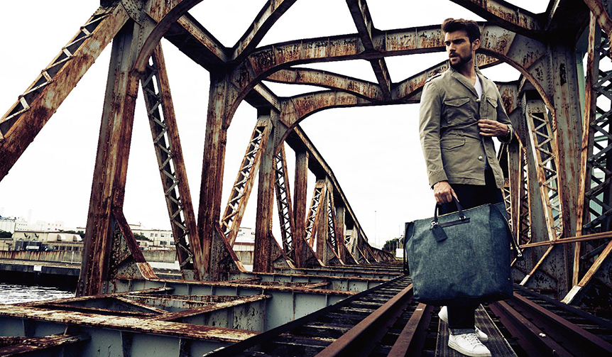 Lighten your step with ecru linen. Set off on a journey with a bag from TRAVER