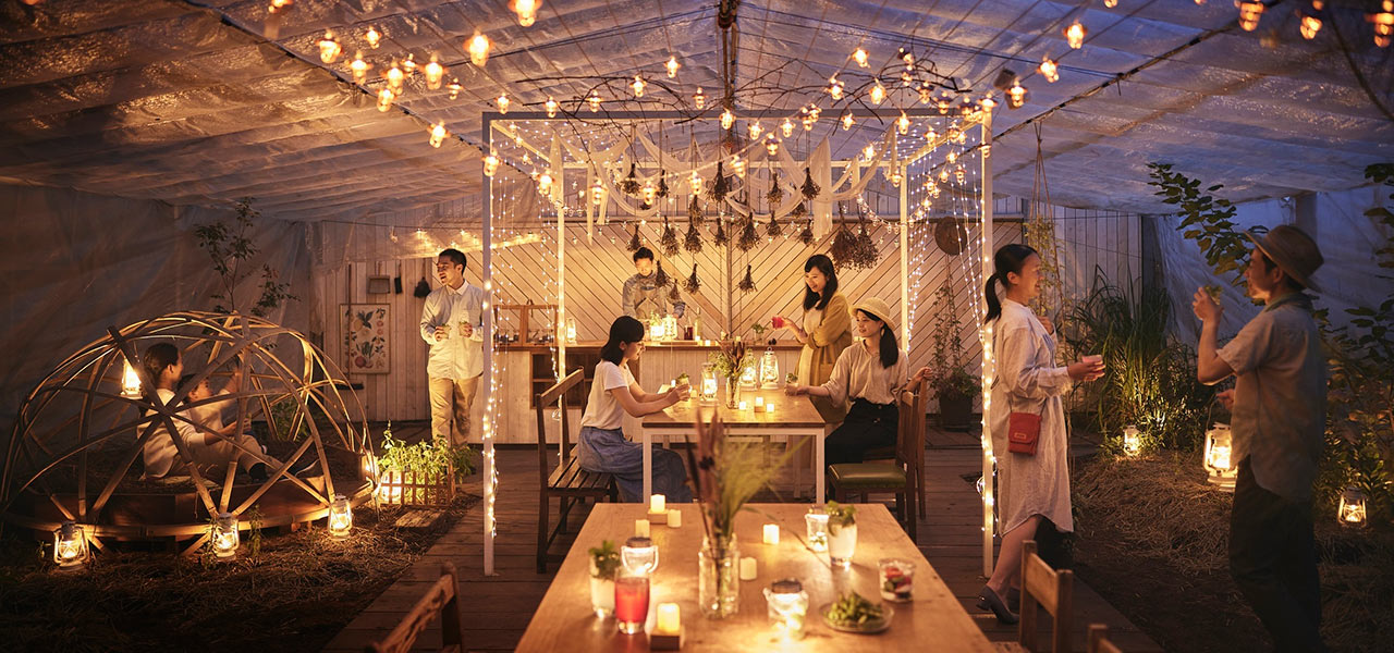 Enjoying the cool evening air in open-air private seating at Agri Beer Garden | TRAVEL