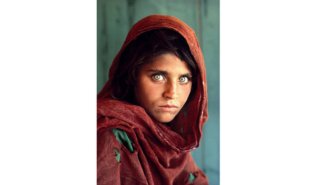 TOKYO PHOTO 2009<br><b>artist:Steve McCurry</b><br>title:Afghan Girl<br>gallery:Mugnum Photos Tokyo<br>year:1984<br>size:11 × 24 inches<br>© Steve McCurry / Magnum Photos
