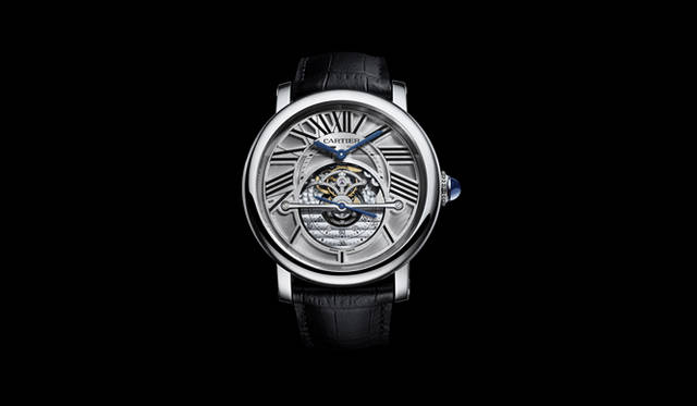 <strong>Cartier｜カルティエ</strong>　ムーブメントの中央に配置された時を刻む脱進機、テンプ、スモールセコンドが一体化した「ローター」が、つねにおなじポジションにもどる仕組み。トゥールビヨンでは排除できない垂直方向の重力の影響をも排除し、5倍も正確に時を刻む機構「アストロレギュレーター」を世界ではじめて搭載した。「ロトンド ドゥ カルティエ　アストロレギュレーター」 2861万2500円（2011年秋頃発売）