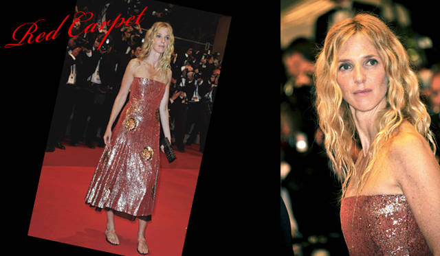 <strong>カンヌ国際映画祭2011</strong>｜Sandrine Kiberlain（サンドリーヌ・キベルラン）はライオンのモチーフがほどこされた、インパクトのあるのグリッターベアドレスに、ロジェ ヴィヴィエのフラットサンダルを合わせカジュアルダウン。裾からのぞくブラックのチュールがアクセントとなったドレスはシャネルクチュールコレクションのもの。