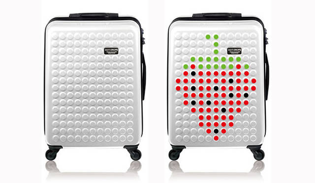<strong>DOTDROPS</strong> - The innovative suitcase you can customize to your liking.