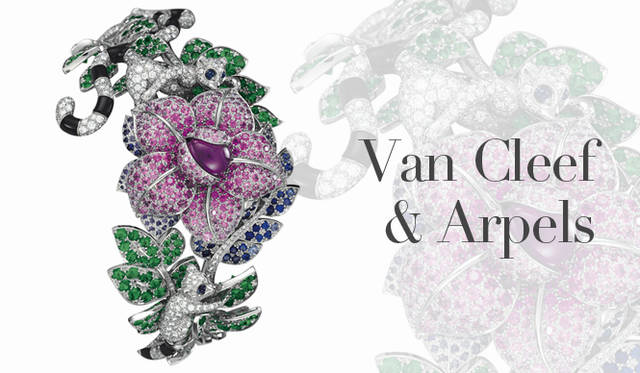 <strong>Van Cleef&Arpels｜ヴァン クリーフ＆アーペル</strong>　作家ジュール・ヴェルヌの小説からインスパイアされたコレクション「レ ヴォワヤージュ エクストラオーディネール™」から。エメラルドとサファイアの花と葉、ダイヤモンドの蔦、ブラックオニキスとダイヤモンドの尾を木の枝に絡ませた2匹のサル……旅の最後にたどりついたジャングルでの探検をジュエリーで表現した。「MAKI ウォッチ」 [WG×ダイヤモンド×エメラルド×サファイア×ブラックオニキス×マザーオブパール]　スイス製クォーツムーブメント　6457万5000円（参考価格）（ヴァン クリーフ＆アーペル）