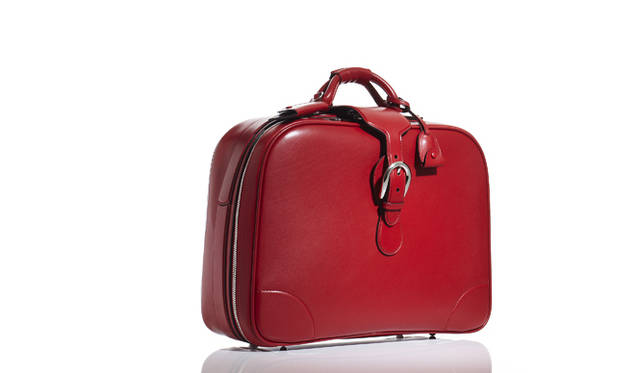 <strong>GUCCI｜グッチ</strong> フロントにはホースシューモチーフのバックルがあしらわれている。ダッフルバッグ [W46×H36×D16cm]  35万7000円