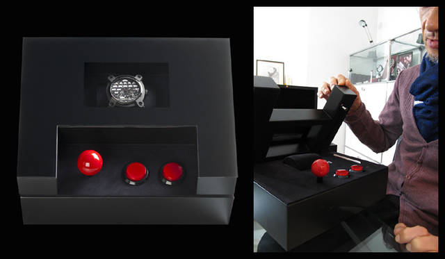 <strong>ROMAIN JEROME</strong> The box is designed to resemble a game console; pressing the button on the right unlocks the glass-topped lid. Other elements are purely decorative.