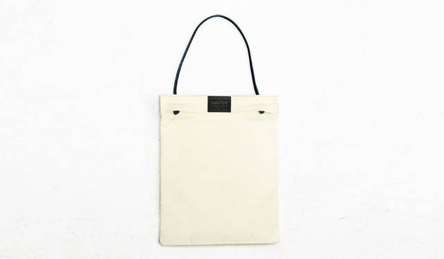 <strong>Maruwakaya × Asakusa Maekawa Inden × Yoshida & Co.</strong> A tote bag inspired by the 'Gassho-bukuro' pouch. ¥24,150