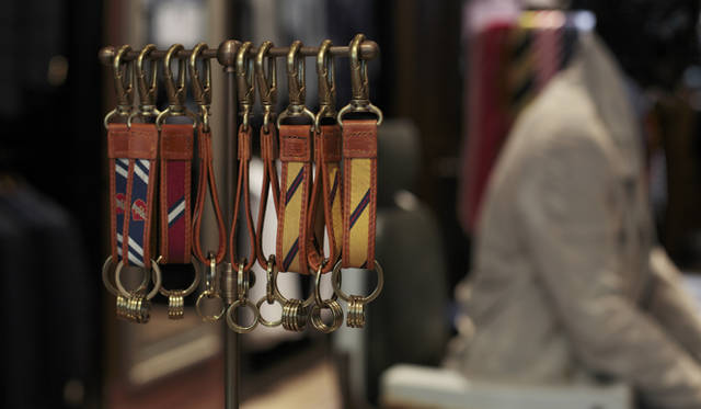 <strong>TOMMY HILFIGER</strong> A preppy striped keychain is also among the commemorative items