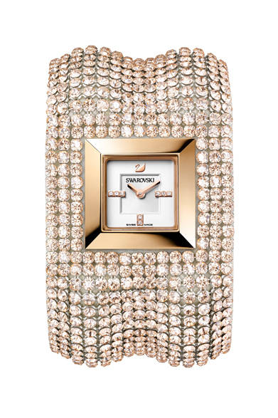 This is the "Elis Bangle Mini," where fashion and watchmaking technology achieve a perfect fusion. The bangle, with its crystal mesh reminiscent of satin silk and embossed finish, uses 744 micro-crystals. It's a bangle watch offering exceptional comfort that gently embraces the wrist.<br /><br /><strong>Elis Bangle</strong><br />¥137,550<br />Quartz, Stainless steel (rose gold PVD) x crystal<br /><br />Swarovski Japan (Customer Relations)<br />Tel. 0120-10-8700<br />www.swarovski.co.jp