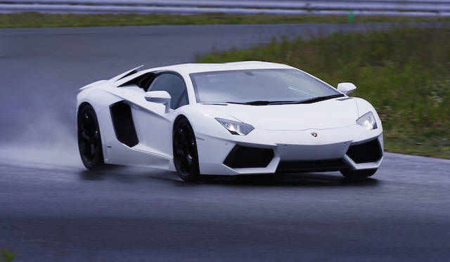 <strong>Lamborghini Aventador LP 700-4</strong><br />The track still bore traces of the rain that had fallen the night before.