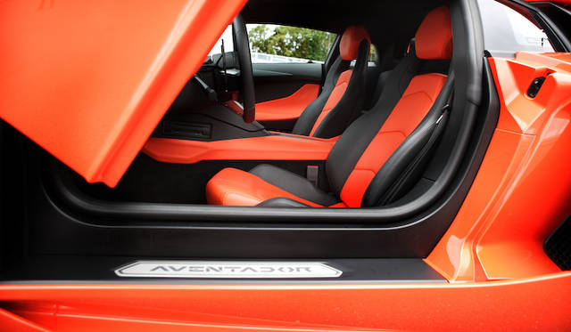 <strong>Lamborghini Aventador LP 700-4</strong><br />The thick sills are characteristic of the upward-swinging doors.
