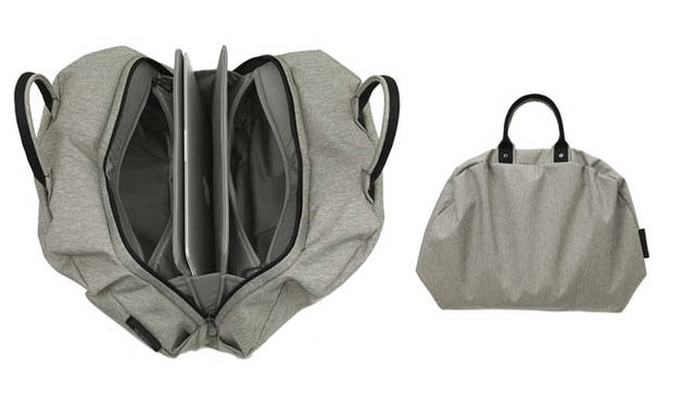 <strong>LIVING MOTIF</strong> | The Bowler Bag, blending seamlessly with both on and off-duty styles. It boasts high fashion appeal with its stylish appearance, unlike a typical computer bag, and its monochrome palette. Its urban, unisex design is a key feature. For MacBook Air 13, ¥18,690.