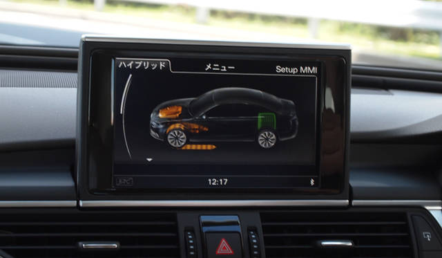 <strong>Audi A6 hybrid</strong><br />Monitor showing energy flow. Photo shows driving under engine power.