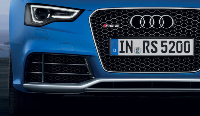 <strong>Audi RS5 Cabriolet</strong><br />RS model's signature exterior, including a honeycomb grille and flared fenders.