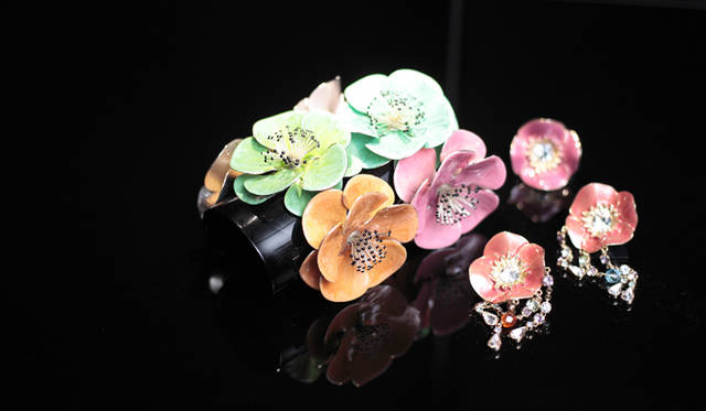 <strong>GIORGIO ARMANI</strong> From the Giorgio Armani Privé Haute Couture collection Autumn/Winter 2011/12. Accessories feature small plum motifs, reminiscent of Japan.