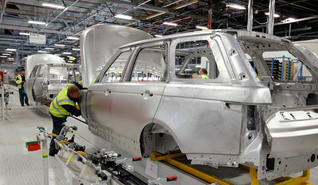 <strong>Land Rover Range Rover</strong><br />The first all-aluminum body in an SUV. The photo shows a white body during manufacturing.