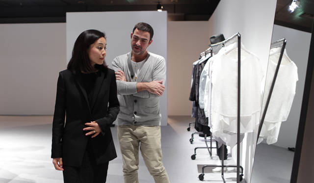 <strong>BERARDI</strong> Berardi intently watches as Hagiwara tries on an outfit.