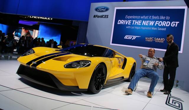 An attraction at the Ford booth. Through hypnosis, subjects suddenly felt as if they were driving a Ford GT.