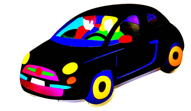 The Fiat 500 wall lighting displayed on the wall is a work by artist Marco Lodola.