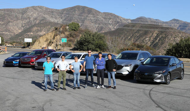 Automotive journalist from Japan. Mr. Yasuhiko Kawamura is on the far left.