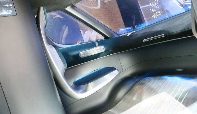 The Mercedes-Benz "Vision Van." It eschews a steering wheel, with the driver operating it via a joystick to the left.
