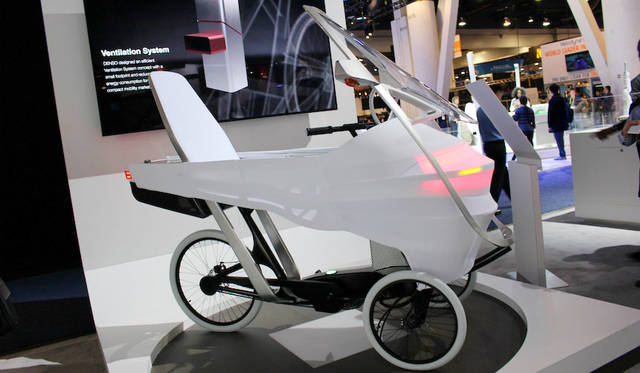 A city commuter developed by Denso in collaboration with the Massachusetts Institute of Technology (MIT). This compact vehicle is equipped with autonomous driving capabilities.