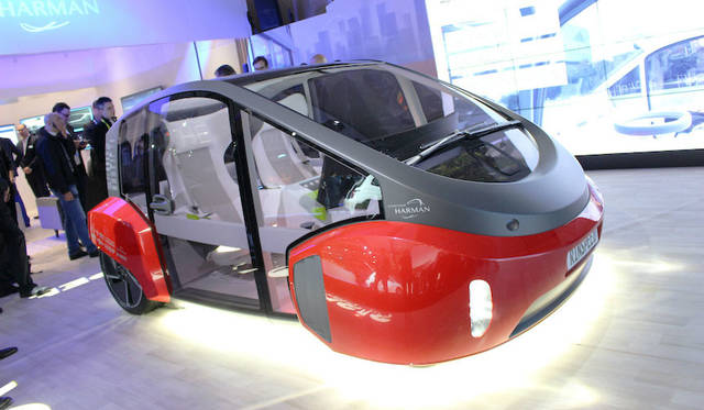 The "Oasis," an autonomous electric commuter concept proposed by Swiss engineering firm Rinspeed. Like Honda's NeuV, it's envisioned for car-sharing, intended for commuting in the morning and evening and for delivery during the day.