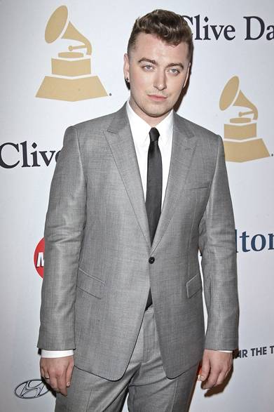 Sam Smith｜サム・スミス<br "/><br "/>British singer Sam Smith won a total of four awards: Record of the Year, Album of the Year, Song of the Year, and Best New Artist.<br "/><br "/>Suit: Giorgio Armani Photo credit: Michael Tran