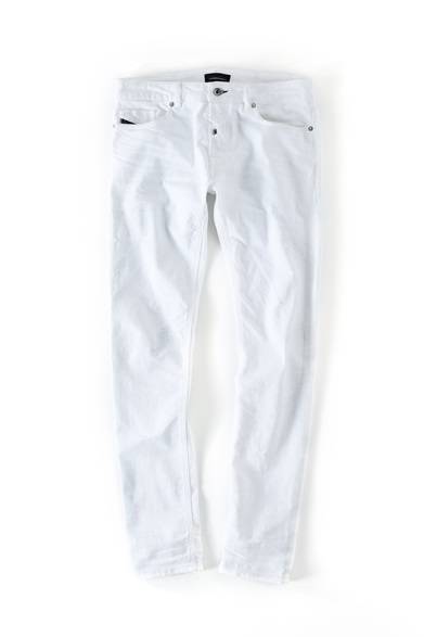 <strong>MENS | </strong> Clean white denim, casually updated with a slight distressed finish. Subtle tone-on-tone paint splatters add a touch of grunge without being too refined or too rough. Denim ¥46,440 (DIESEL BLACK GOLD)