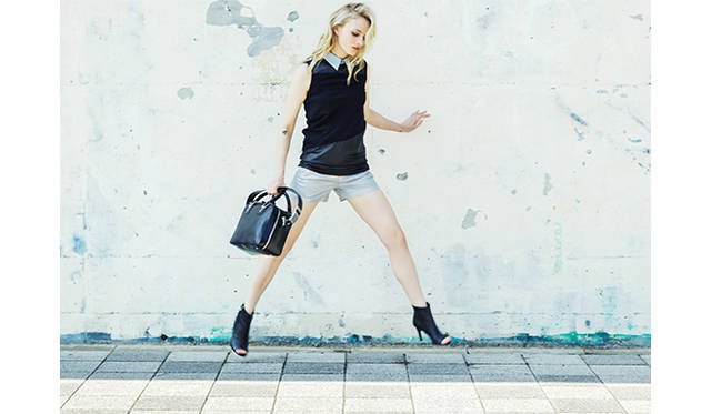 Sleeveless shirt ¥19,224, denim shorts ¥44,280, booties ¥99,360, bag ¥110,160, top (price not available) (all DIESEL BLACK GOLD)