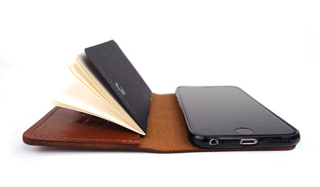 <strong>RED CLOUDS COLLECTIVE</strong><br />Book-style leather iPhone case "the GOOD book"
