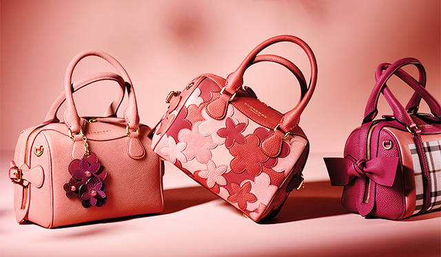 Limited edition handbags commemorating the Shinsaibashi store opening. From left: ¥453,600 (with key charm), ¥410,400, ¥313,200.