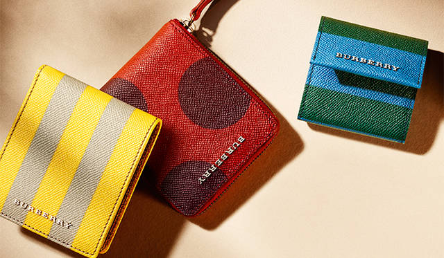Limited edition items to celebrate the Shinsaibashi store opening. From left and center: bi-fold wallets, ¥56,160 each. Right: coin purse, ¥38,880.