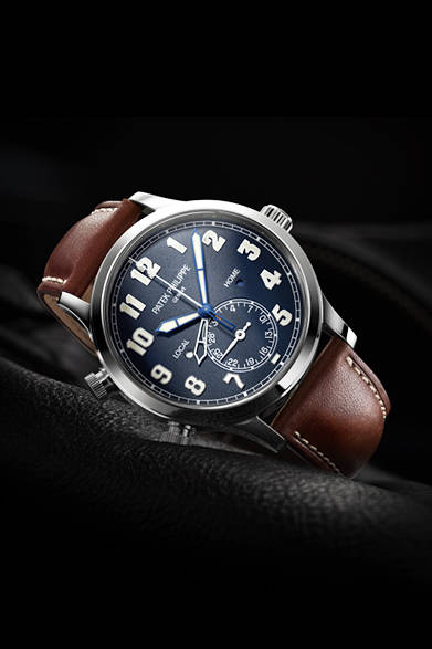 <strong>Calatrava Pilot Travel Time 5524</strong><br/>Case: 18K White Gold<br/>Diameter: 42mm<br/>Thickness: 10.78mm<br/>Movement: Self-winding (Cal. 324 S C FUS)<br/>Functions: Dual time zone display (local and home times shown by two separate hour hands), dual day/night indicators (corresponding to the two time zones), push-piece adjustment of the second hour hand (for local time), date display (pointer-type in a sub-dial at 6 o'clock)<br/>Strap: Calfskin<br/>Water resistance: 3 bar<br/>Release: Scheduled for Autumn 2015<br/>Estimated price: ¥5,432,400<br/>