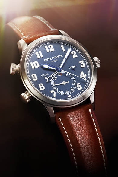 <strong>Calatrava Pilot Travel Time 5524</strong><br/>Case: 18K White Gold<br/>Diameter: 42mm<br/>Thickness: 10.78mm<br/>Movement: Self-winding (Cal. 324 S C FUS)<br/>Functions: Dual time zone display (local and home times shown by two separate hour hands), dual day/night indicators (corresponding to the two time zones), push-piece adjustment of the second hour hand (for local time), date display (pointer-type in a sub-dial at 6 o'clock)<br/>Strap: Calfskin<br/>Water resistance: 3 bar<br/>Release: Scheduled for Autumn 2015<br/>Estimated price: ¥5,432,400<br/>