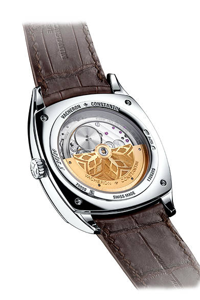 The ultra-thin automatic Calibre 1120 AT. The flat movement surface is adorned with fine Côtes de Genève decoration.