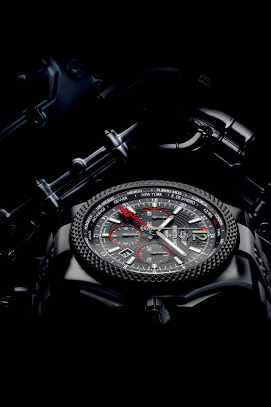 <strong>BENTLEY GMT LIGHT BODY B04 MIDNIGHT CARBON</strong><br/>Case: Black titanium<br/>Diameter: 49mm<br/>Movement: Automatic (Cal. B04)<br/>Functions: Chronograph (30-minute and 12-hour counters), second time zone (home time displayed via central 24-hour hand), world time (city ring adjusted by rotating bezel for 24 time zones)<br/>Strap: Black rubber<br/>Water resistance: 100m<br/>Release: Summer 2015 (scheduled)<br/>Price: ¥2,116,800<br/>