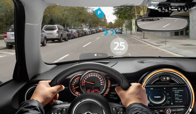 Displays speed limits read from signs and guides to available parking spaces