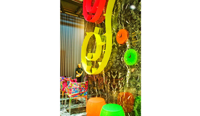 Bookshelf "POPWORM" by Ron Arad, Chair "MADAME – World of Emilio Pucci edition" by Philip Stark, Clock "CRYSTAL PALACE" by Alessandro Mendini, Stool "ROY" by Alessandro Mendini<br> The "MADAME – World of Emilio Pucci edition" chair designed by Philippe Starck features four color textiles inspired by the cities of Paris, Rome, New York, and Shanghai.
