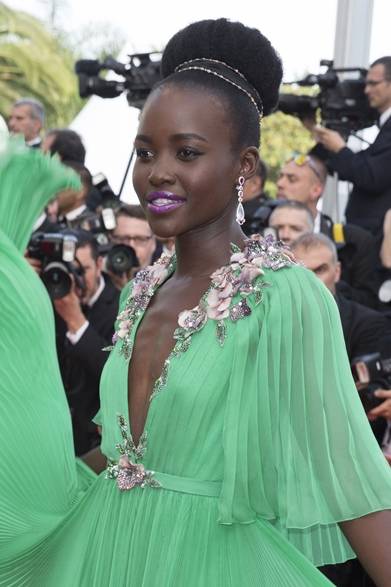 Dress: Gucci<br />Jewelry: Chopard<br />At the Opening Ceremony