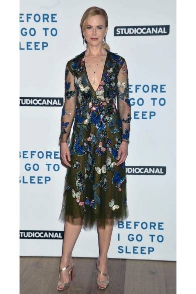 <strong>Nicole Kidman</strong><br /><br />At the premiere of the film 'Before I Go To Sleep' in London, Nicole Kidman appeared in a Valentino dress. The green chiffon dress was embroidered with a pattern of fluttering butterflies, creating a vibrant and lively style. Gold heels added an accent to her footwear.