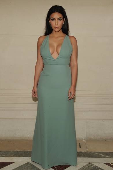 <strong>Kim Kardashian</strong><br /><br />Kim Kardashian, wife of Kanye West, also appeared at the Valentino show. She wore a simple mint green dress, with the daringly exposed neckline being a signature look for Kim, who avoids excessive adornment.
