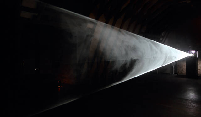 Anthony McCall, "Line Describing Conic Sections," 1973. Film installation, variable dimensions. Exhibition view: Centre d'art contemporain de Rochechouart, 2007. Photo: Freddy Le Saux. *Reference image