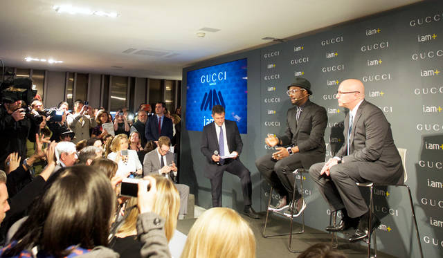 Stefano Randazzo, President & CEO of Gucci Timepieces (right), and will.i.am, at the special stage set up in front of the Gucci booth.