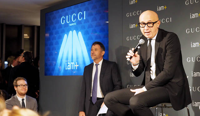Marco Bizzarri, President & CEO of Gucci (right).