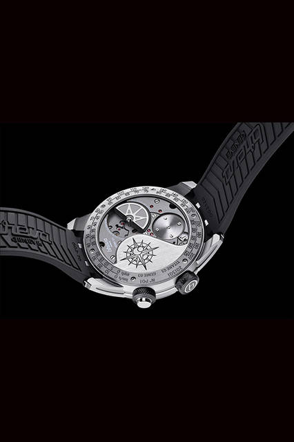 <strong>Genny 03</strong><br />Case: Grade 5 Titanium<br />Diameter: 47.5mm<br />Thickness: 17.5mm (23.5mm with speedometer open)<br />Movement: Automatic (Cal.BRE03.001)<br />Functions: Speed display (displays wind speed hitting the watch)<br />Strap: Rubber<br />Water Resistance: 30m (watch case at all times; speedometer section only when closed)<br />Estimated Price: ¥9,720,000<br />*Available in km/h and mph measurement versions.<br />