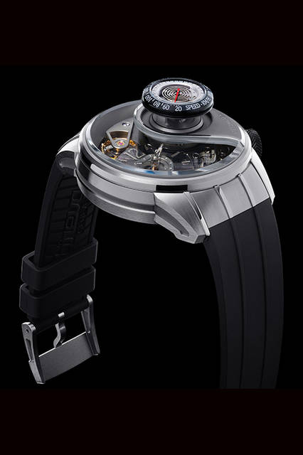 <strong>Genny 03</strong><br />Case: Grade 5 Titanium<br />Diameter: 47.5mm<br />Thickness: 17.5mm (23.5mm with speedometer open)<br />Movement: Automatic (Cal.BRE03.001)<br />Functions: Speed display (displays wind speed hitting the watch)<br />Strap: Rubber<br />Water Resistance: 30m (watch case at all times; speedometer section only when closed)<br />Estimated Price: ¥9,720,000<br />*Available in km/h and mph measurement versions.<br />