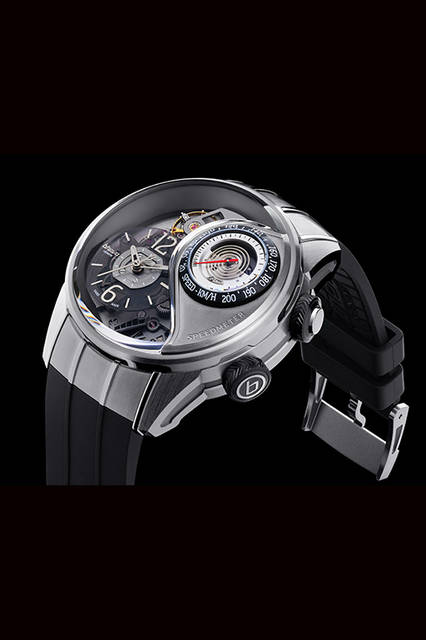 <strong>Genny 03</strong><br />Case: Grade 5 Titanium<br />Diameter: 47.5mm<br />Thickness: 17.5mm (23.5mm with speedometer open)<br />Movement: Automatic (Cal.BRE03.001)<br />Functions: Speed display (displays wind speed hitting the watch)<br />Strap: Rubber<br />Water Resistance: 30m (watch case at all times; speedometer section only when closed)<br />Estimated Price: ¥9,720,000<br />*Available in km/h and mph measurement versions.<br />