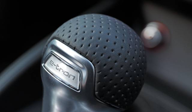 The shift knob is exclusive, with "e-tron" engraved on it.